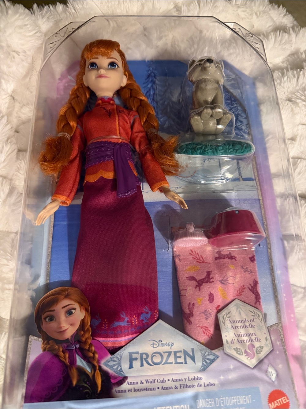Disney Anna Fashion Doll with Wolf Cub - Red, Purple
